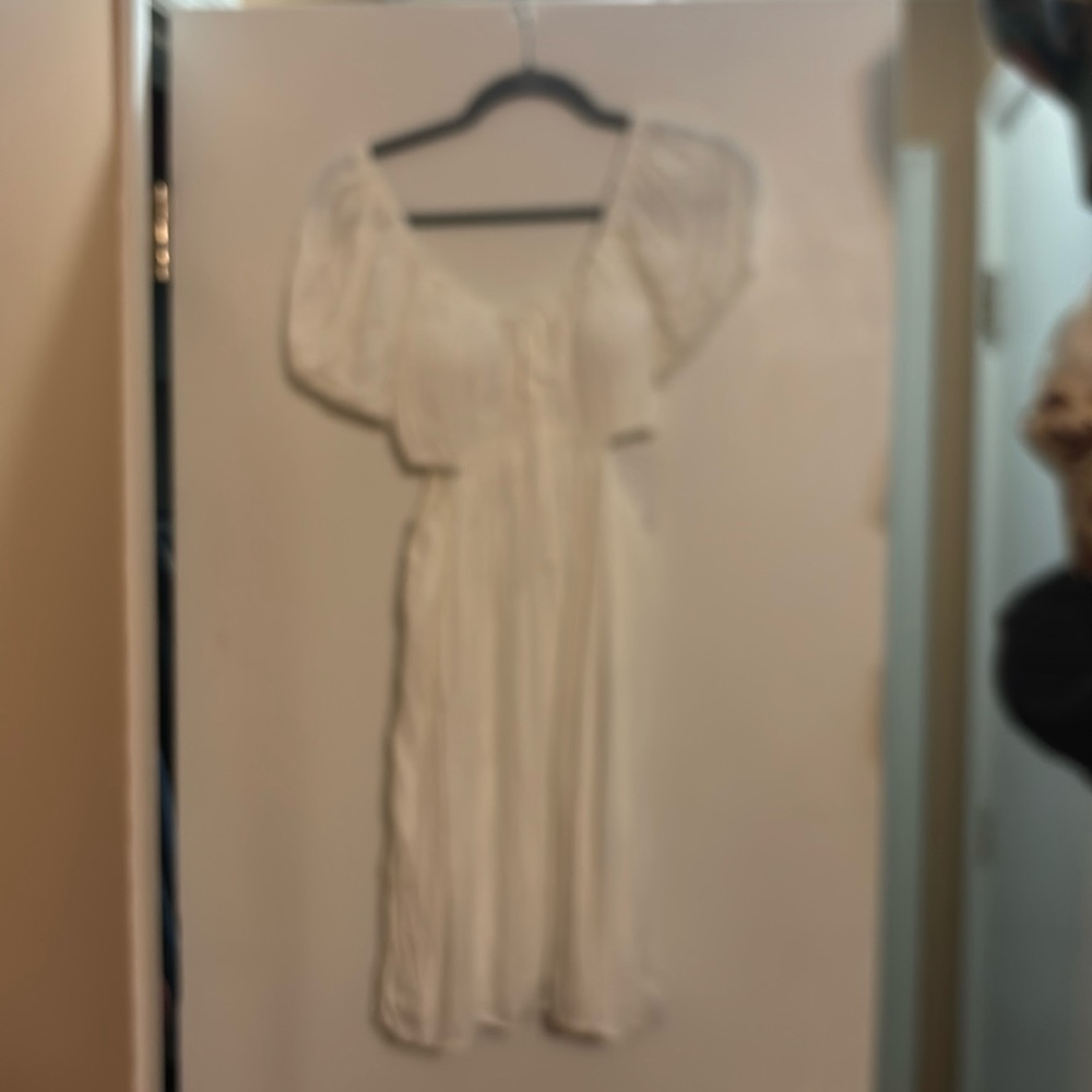 Cream side split dress never worn with tags.